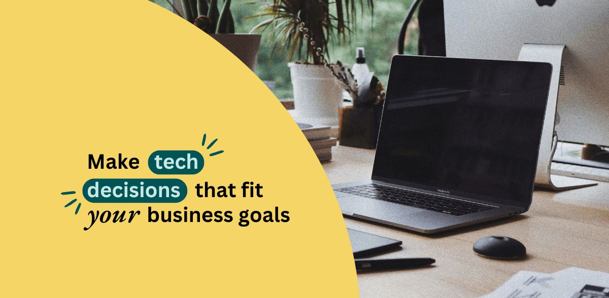 "make tech decisions that fit your business goals" text on yellow half circle background with laptop set up on desk behind