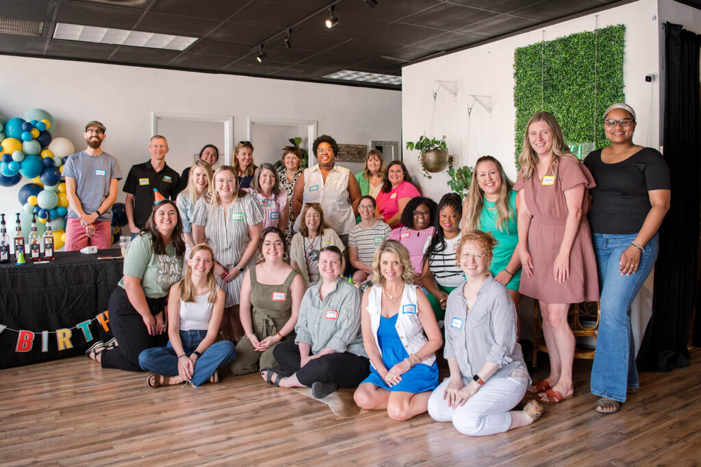 Group photo of Rising Tide Birmingham members who attended the birthday brunch