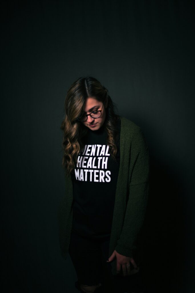 Woman wearing tshirt that says Mental Health Matters